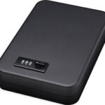 Black compact safe with a numeric keypad on top and rounded edges, used to store valuables securely.