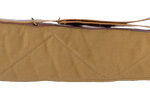 Long tan fabric rifle case with zipper and brown leather end caps laid flat