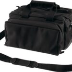Black camera bag with top handles and an adjustable shoulder strap for easy carrying
