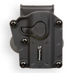 Dark gray polymer pistol holster with retention latch and belt clip, viewed from above.