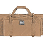 Tan tactical gear bag with MOLLE webbing on the sides and a central front pocket, shown from the front (duffel style).