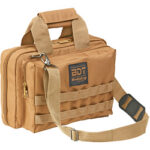 Tan multi-pocket tool bag with two zip compartments, two top handles, and an adjustable shoulder strap.