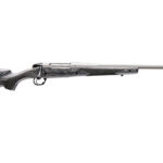 Long bolt-action rifle with a wooden stock and long barrel on a white background.