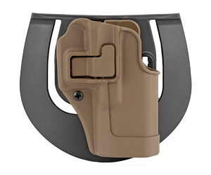 Tan polymer pistol holster attached to a gray backing plate, viewed from above.