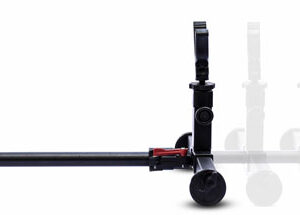 Camera slider dolly rig on a long black rail with two vertical supports on each end