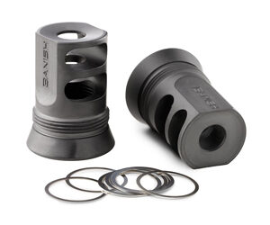 Two gray metal cylindrical valve-like parts with holes, shown with several circular washers (shim rings) beside them — a small hardware kit.