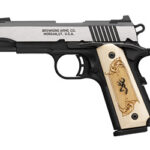 Semi-automatic pistol with a silver slide, black frame, and an ornate ivory grip engraved with a design.