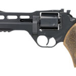 Side view of a black revolver-style handgun with a brown textured grip and a tactical rail along the frame
