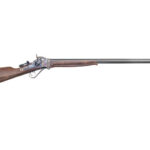Antique muzzle-loading rifle with a wooden stock and long steel barrel.