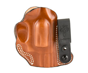 Brown leather handgun holster with a black belt clip attached
