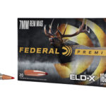 Two rifle bullets next to a Federal Premium 7mm Rem Mag ELD-X 180 grain ammunition box.