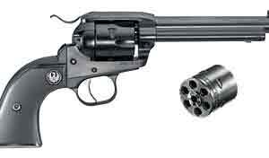 Six-shot revolver pistol with an exposed cylinder and a separate extra cylinder beside it.