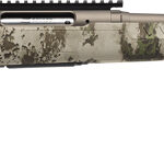 Camouflage-pattern hunting rifle in side profile, showing stock, bolt-action receiver, and long barrel