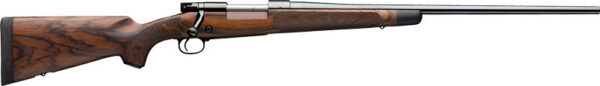 Bolt-action hunting rifle with a wooden stock and long steel barrel on a white background.