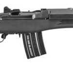 Black AK-style rifle with a curved magazine on a white background