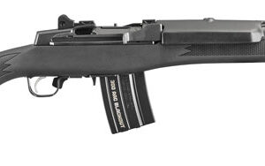 Black AK-style rifle with a curved magazine on a white background