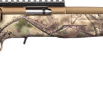 Camouflage-pattern bolt-action hunting rifle with a synthetic stock and long beige barrel with a muzzle brake on a white background