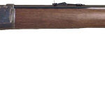 Lever-action rifle with wooden stock and long steel barrel photographed from the side
