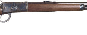 Lever-action rifle with wooden stock and long steel barrel photographed from the side