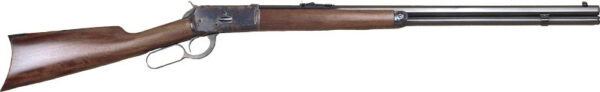 Lever-action rifle with wooden stock and long steel barrel photographed from the side