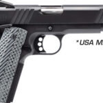 Side view of a black semi-automatic handgun with a patterned silver grip and 'USA MADE' text on the slide