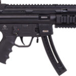 AR-style rifle with a collapsible stock, quad-rail handguard, and curved magazine viewed from the side