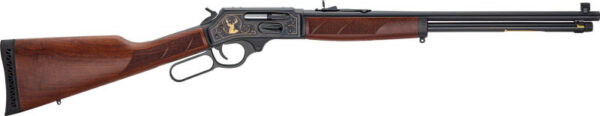 Lever-action rifle with a wooden stock, long barrel, and decorative engraving on the action.