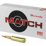 Box of Hornady MATCH ammunition (20 cal) with two rifle bullets beside it on a white background.