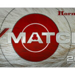Box of Hornady V-Match ammunition with a red bullseye design, labeled 20 cartridges.