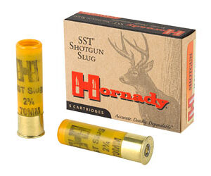 Two yellow brass shotgun slug shells with a Hornady SST Shotgun Slug box beside them