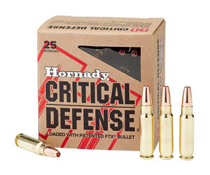 Box of Hornady Critical Defense handgun ammo with three rounds standing upright and one cartridge lying flat beside it.