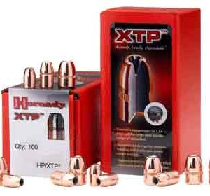 Red packaging labeled XTP ammunition with copper bullets scattered around