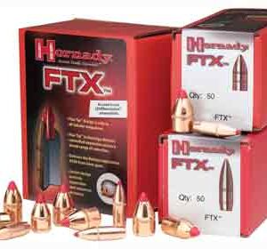Red display boxes labeled FTX ammo with several brass bullets arranged in front, showcasing the product packaging.