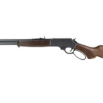 Side-by-side double-barrel shotgun with a wooden stock shown in profile.