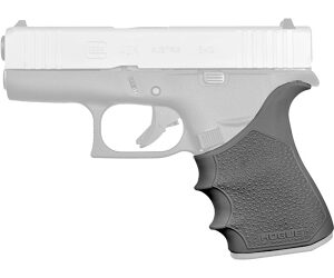 Side view of a semi-automatic pistol with a white slide and black textured grip.