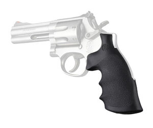 Side view of a silver revolver with a black textured grip on a white background