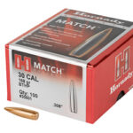 Red Hornady Match ammo box for .308 caliber, 168-grain BTHP rounds, with two bullets lying beside the box.