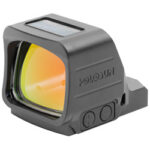 Compact reflex sight with orange-tinted lens mounted on a rail for firearm aiming systems.
