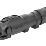 Black compact tactical flashlight with a mounting foot, designed to be attached to a firearm.