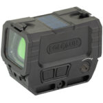Compact holographic rifle sight with a green-tinted lens and rugged black housing, mounted for firearms use.