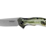 Fixed-blade knife with a fish-shaped handle in green scale-pattern, blade extending from the molded fish grip.