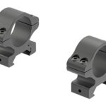 Pair of gray cylindrical rifle scope rings with mounting bases for rail attachment, viewed from the front.