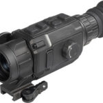 Black tactical night-vision monocular with rubber eyepiece, control buttons on top, and a mounting rail for low-light observation.