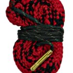 Red and black braided rope coiled with a black cord wrapped around it and a small brass metal tag at the end