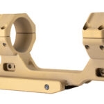 Gold-colored double scope ring mount with two clamps on a flat base, used to attach a rifle scope.