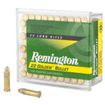 Remington .22 Long Rifle Golden Bullet ammunition box with several loose cartridges beside it.
