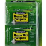 Two Remington Rem Oil Wipes in a green blister pack for firearm maintenance (two wipes).","Close-up of Remington Rem Oil Wipes packaging in a blister pack showing two wipe packets.","Green Rem Oil Wipes blister pack with two wipes for gun cleaning.