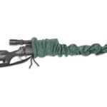 Rifle with a green rope coiled around the barrel.