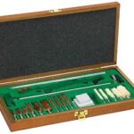 Wooden case opened to reveal a precision screwdriver set with bits, tweezers, and small accessories inside.