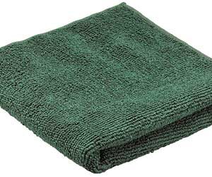 Dark green folded towel with a plush texture.